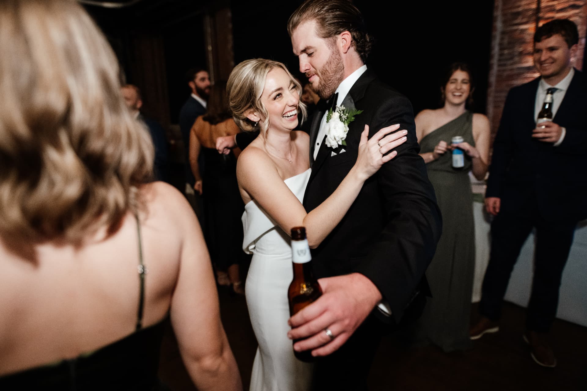 Sydney and Duncan dancing among their guests